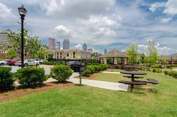 Outdoor Grilling Area next to spacious pavilion at Ashley Auburn Pointe in Atlanta, GA